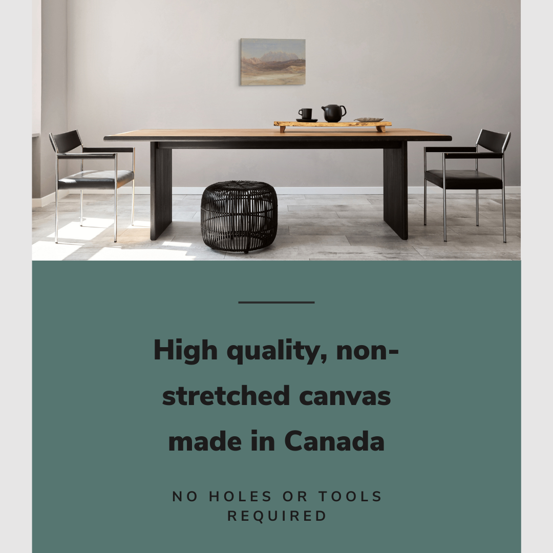 Lifestyle image of the horizontal 16x24” inch easy to hang canvas wall art hung in a dining room above a dining table with graphic saying "High quality, non-stretched canvas made in Canada."