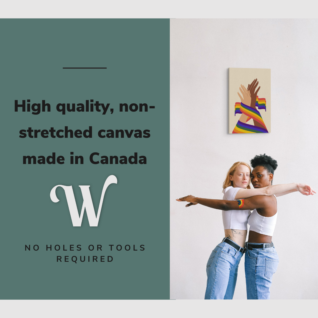 Lifestyle image of the vertical, 16x24 inch easy to hang canvas wall art hung in hung on a plain wall over a lesbian, biracial couple with graphic saying "High quality, non-stretched canvas made in Canada"