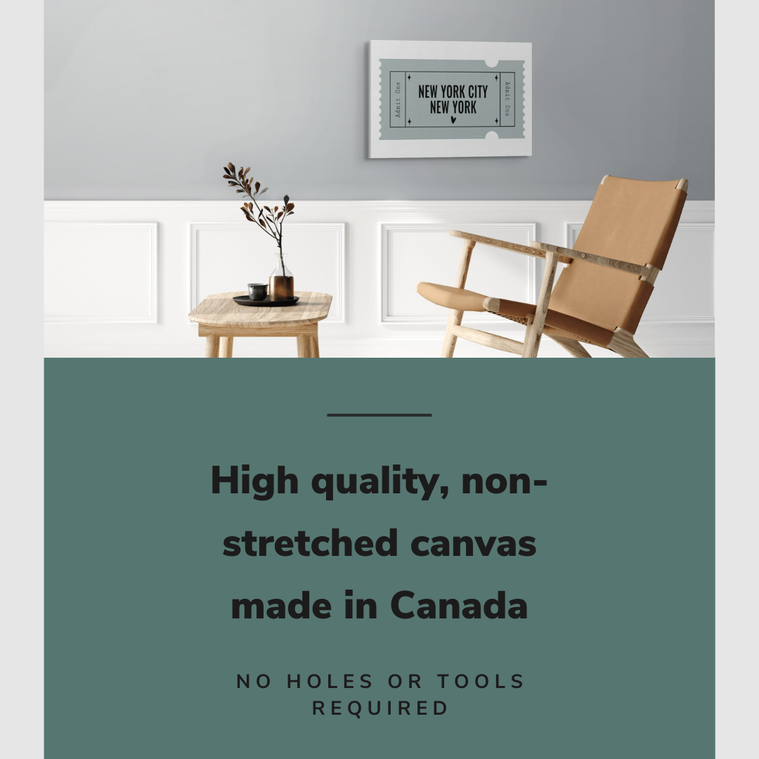 Lifestyle image of the horizontal, 20x30” inch easy to hang canvas wall art hung in a living room above a chair and table with graphic saying "High quality, non-stretched canvas made in Canada"