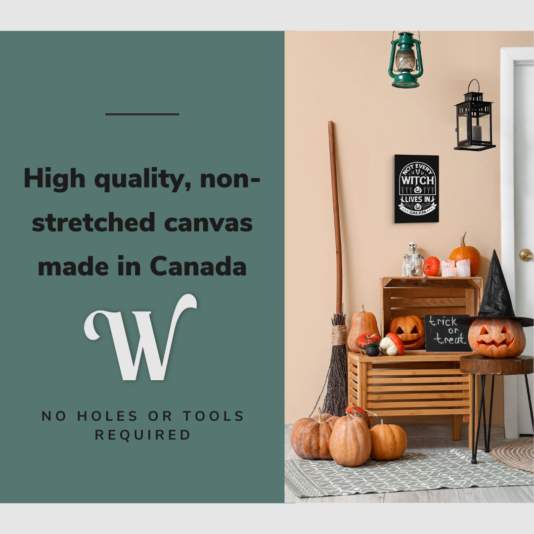 Lifestyle image of the vertical 12x18” inch easy to hang canvas wall art hung beside a front door above some Halloween decorations with graphic saying "High quality, non-stretched canvas made in Canada."