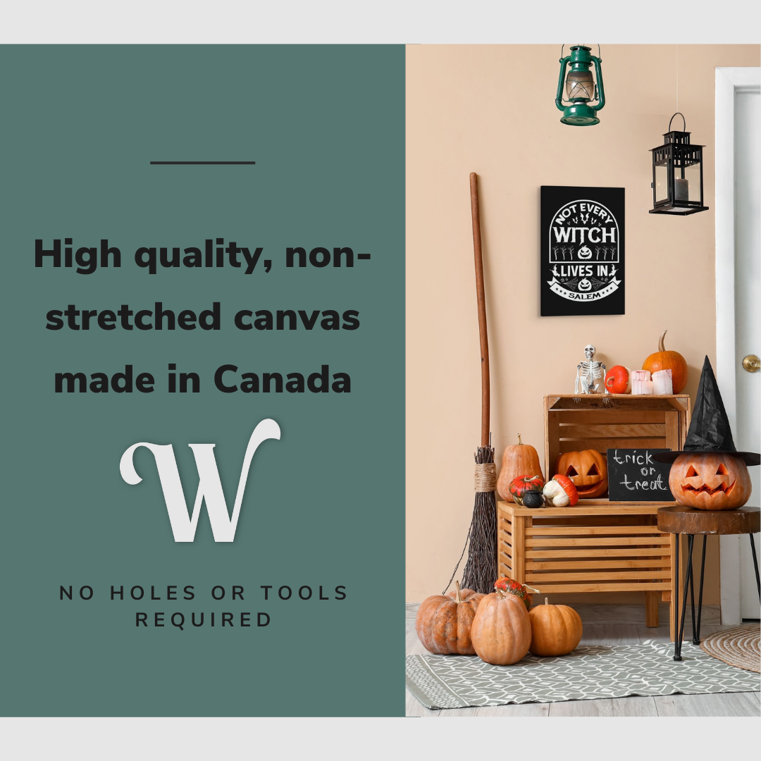 Lifestyle image of the vertical 16x24” inch easy to hang canvas wall art hung beside a front door above some Halloween decorations with graphic saying "High quality, non-stretched canvas made in Canada."