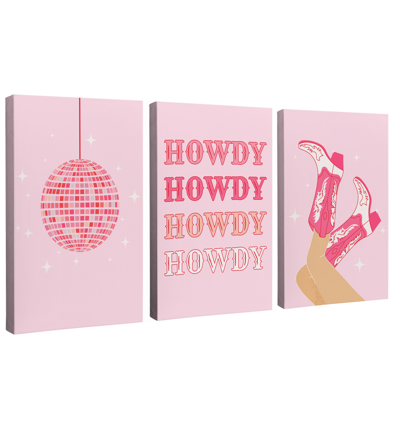 Set of 3, 2:3 vertical easy to hang canvas prints on a transparent background featuring images of a pink disco ball, "Howdy" written in a vintage Western font, and legs in the air wearing pink cowboy boots all on light pink backgrounds.