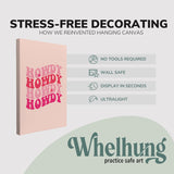 Single, 2:3 vertical easy to hang canvas print on a graphic displaying the stress-free decorating Whelhung offers, how we reinvented hanging canvas: "no tools required", "wall safe", "display in seconds" and "ultralight."