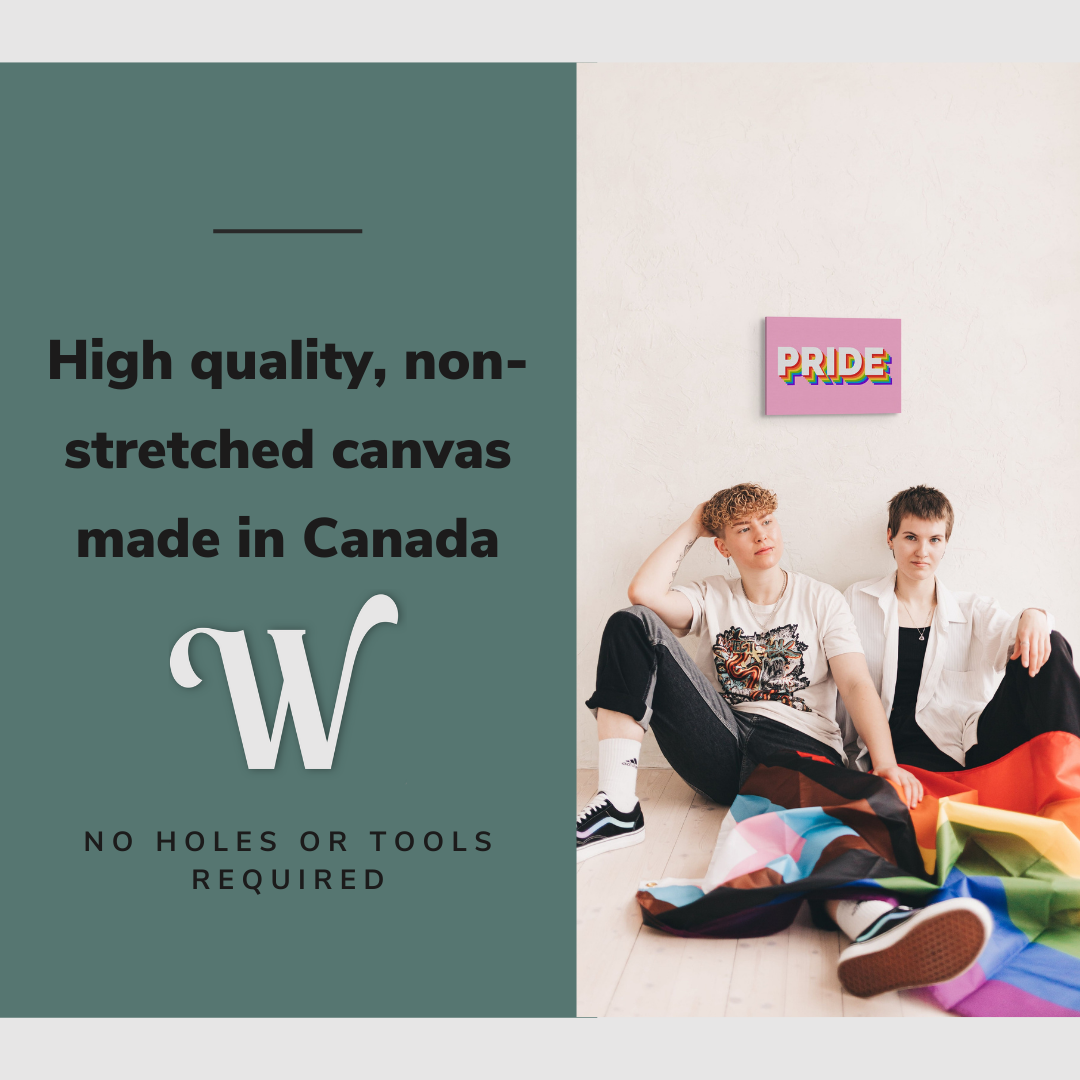 Lifestyle image of the vertical, 12x18 inch easy to hang canvas wall art hung in on a blank wall above a gay couple holding a pride flag with graphic saying "High quality, non-stretched canvas made in Canada"