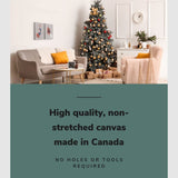 Lifestyle image of the vertical, 18x24 inch easy to hang canvas wall art hung in a christmas decorated living room hung above a couch beside a christmas tree with graphic saying "High quality, non-stretched canvas made in Canada"