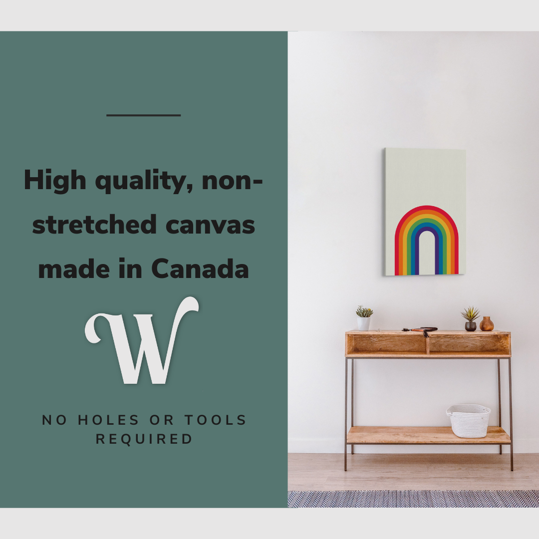 Lifestyle image of the vertical, 20x30 inch easy to hang canvas wall art hung in a minimalist hallway hung over a credenza  with graphic saying "High quality, non-stretched canvas made in Canada"