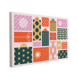 single, 2:3 horizontal easy to hang canvas print on a transparent background featuring an image of a group of geometric, square and rectangular christmas gifts wrapped in retro styled wrapping paper