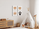 Lifestyle image of the four paneled canvas safari-themed wall art hung in a nursery or child's bedroom beside a teepee and giraffe stuffed animal.