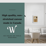 Lifestyle image of the vertical, 16x24 inch easy to hang canvas wall art hung in a dining room of a restaurant above a booth table with graphic saying "High quality, non-stretched canvas made in Canada"