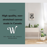 Lifestyle image of the vertical 16x24” inch easy to hang canvas wall art hung in “room description” with graphic saying "High quality, non-stretched canvas made in Canada."