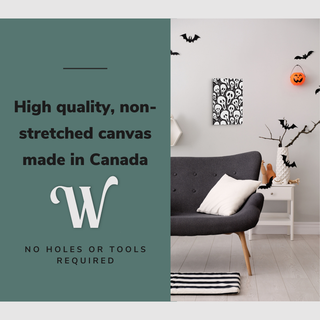 Lifestyle image of the vertical 12x18” inch easy to hang canvas wall art hung in a Halloween decorated living room above a couch with graphic saying "High quality, non-stretched canvas made in Canada."