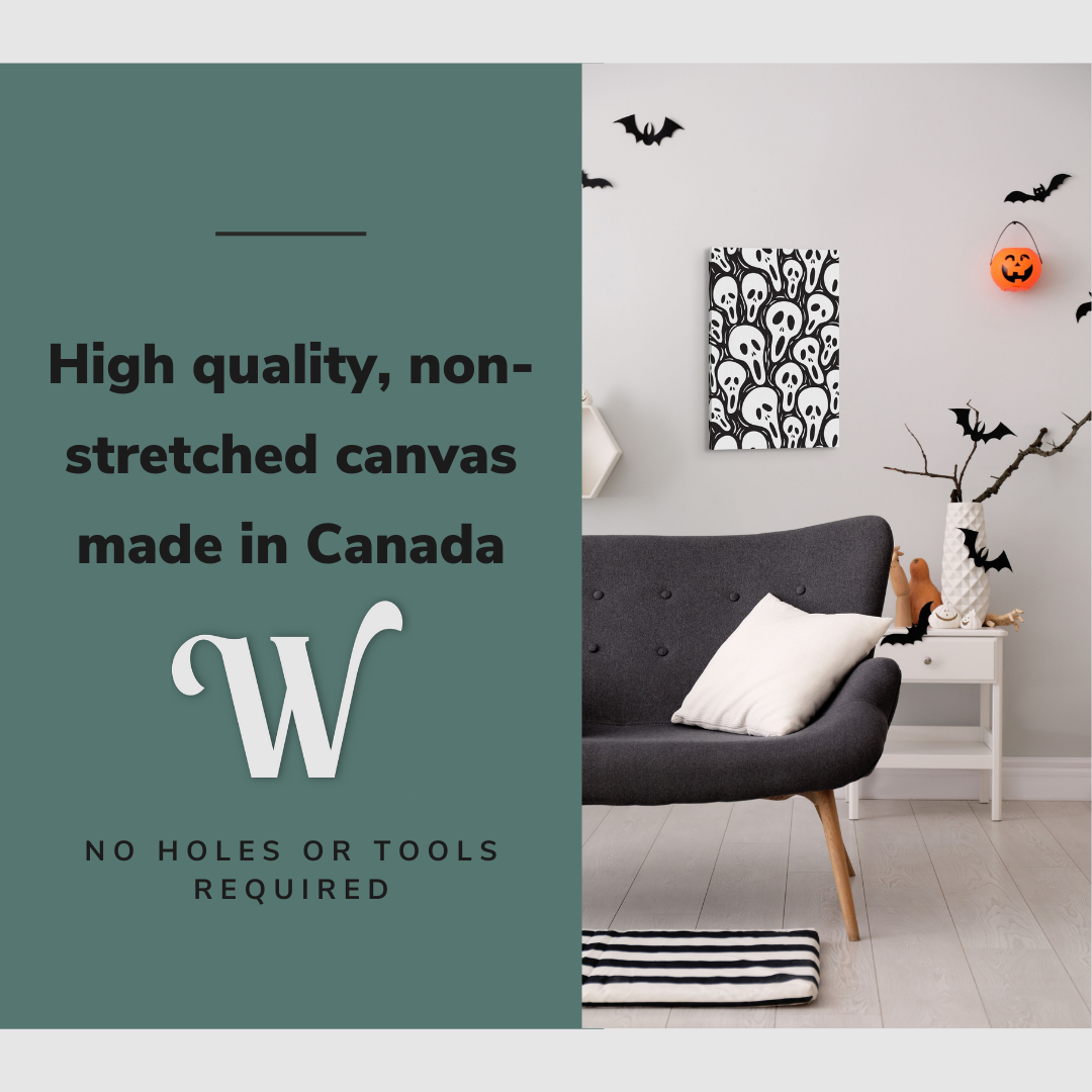 Lifestyle image of the vertical 16x24” inch easy to hang canvas wall art hung in a Halloween decorated living room above a couch with graphic saying "High quality, non-stretched canvas made in Canada."