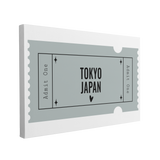 Single, 2:3 horizontal easy to hang canvas print on a transparent background featuring an image of a blue graphic Admit One ticket with words in black, "Tokyo, Japan"