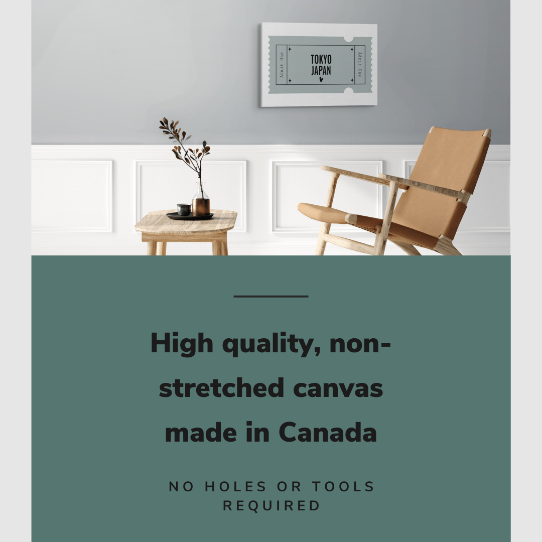 Lifestyle image of the horizontal, 20x30” inch easy to hang canvas wall art hung in a living room above a table and chair with graphic saying "High quality, non-stretched canvas made in Canada"