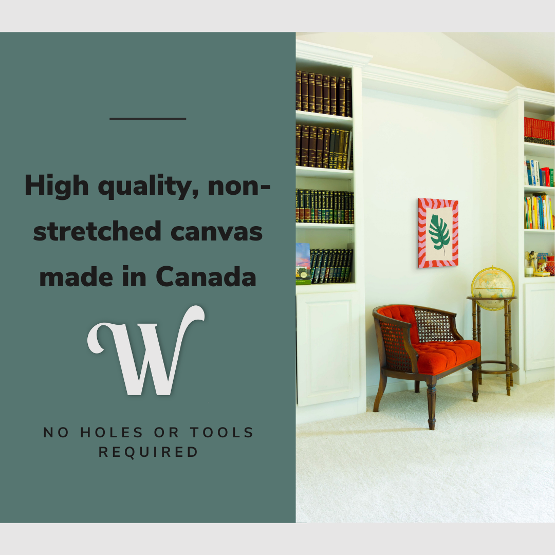 Lifestyle image of the vertical 12x18" inch easy to hang canvas wall art hung in a living room library above a chair and globe with graphic saying "High quality, non-stretched canvas made in Canada"