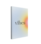 single, 2:3 vertical easy to hang canvas print on a transparent background featuring an image of a large gradient circle, half on the canvas in yellow and orange colors, pulsing on a beige background with the word "vibes" in black in the center