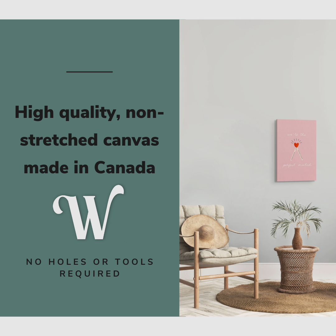 Lifestyle image of the vertical, 16x24 inch easy to hang canvas wall art hung in in a minimalist living room between two beige chairs  with graphic saying "High quality, non-stretched canvas made in Canada"